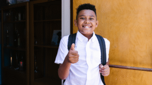 Cultivating Peer Leadership happy student thumbs uip